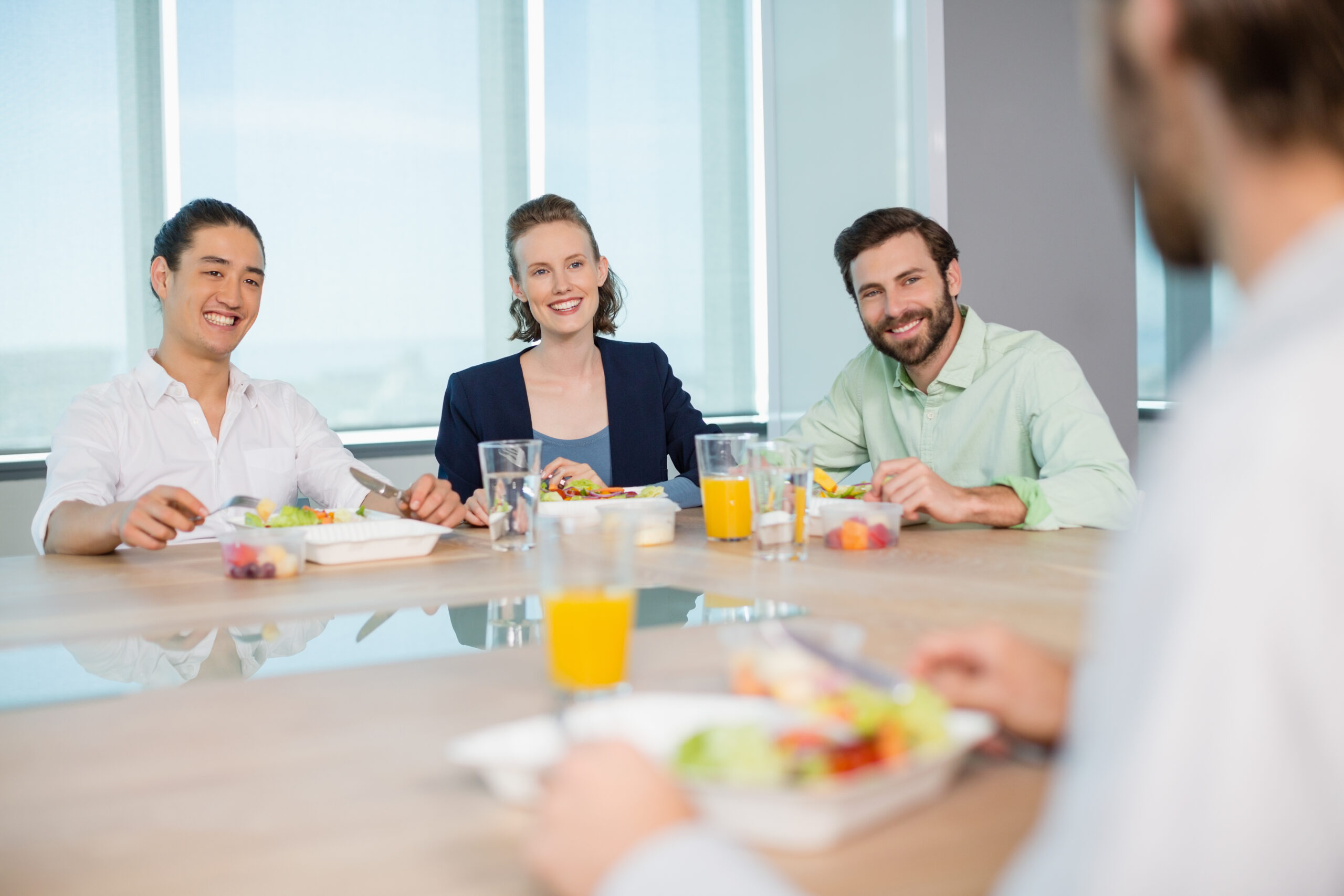 smiling-business-executives-interacting-while-havi-2026-01-11-10-33-15-utc